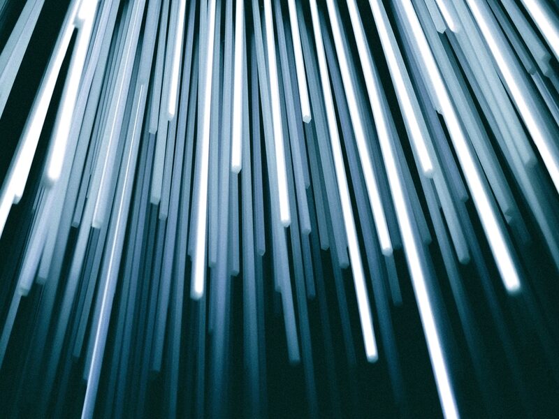 Close-up of illuminated fibre optic strands representing AT&T Fiber internet service